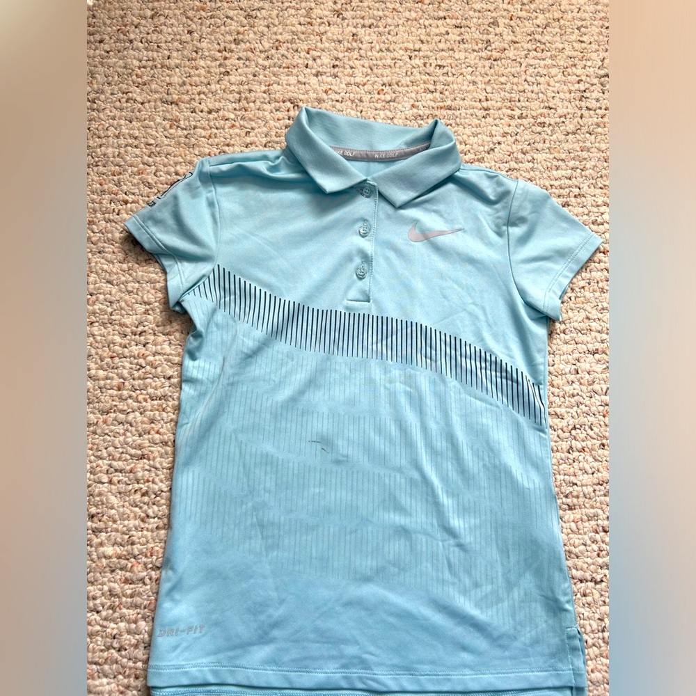 Nike Golf shirt, light blue with black ana grey thin stripes. Size XS